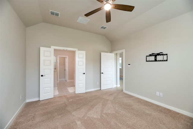 222 Goosewood Dr, Mckinney, TX 75071 - unfurnished bedroom featuring lofted ceiling, light colored carpet, baseboards, and a ceiling fan