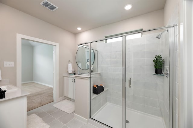 222 Goosewood Dr, Mckinney, TX 75071 - bathroom with vanity, a shower stall, tile patterned floors, and recessed lighting