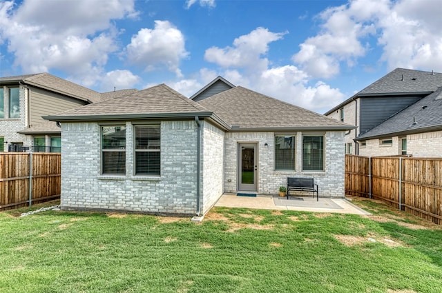 222 Goosewood Dr, Mckinney, TX 75071 - rear view of property featuring a patio, brick siding, and a shingled roof