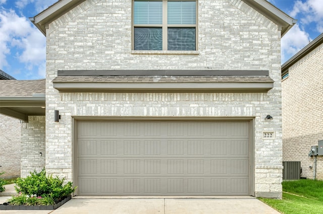 222 Goosewood Dr, Mckinney, TX 75071 - garage featuring driveway and central AC unit