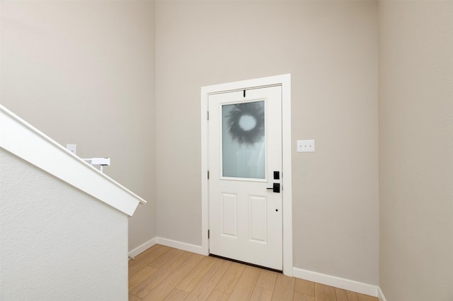 222 Goosewood Dr, Mckinney, TX 75071 - entryway with light wood-type flooring and baseboards