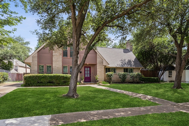 12217 Veronica Rd, Farmers Branch, TX 75234 - view of front of property featuring brick siding and a chimney