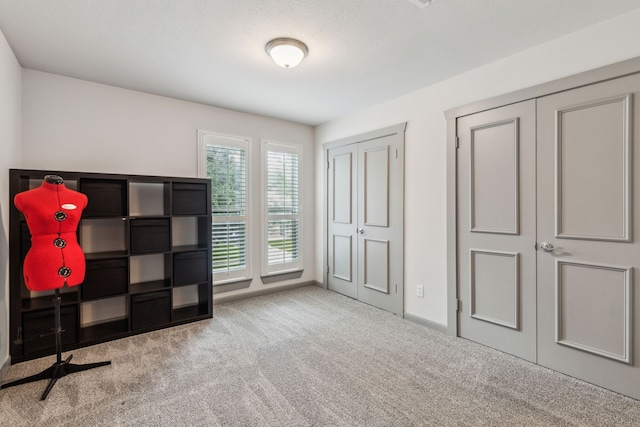 12217 Veronica Rd, Farmers Branch, TX 75234 - unfurnished bedroom featuring carpet flooring