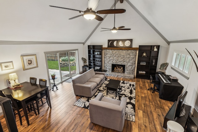 12217 Veronica Rd, Farmers Branch, TX 75234 - living area featuring high vaulted ceiling, a ceiling fan, wood-type flooring, a fireplace, and crown molding