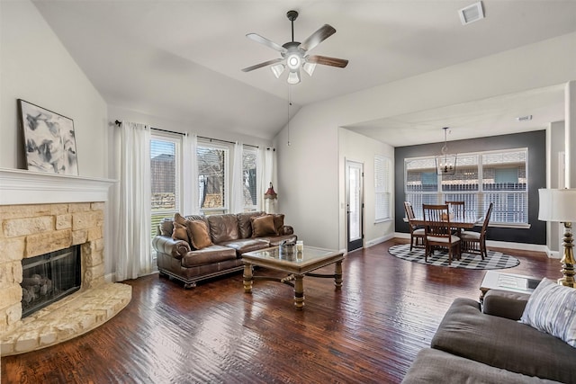 952 Tara Dr, Burleson, TX 76028 - living area featuring a ceiling fan, wood finished floors, vaulted ceiling, a fireplace, and baseboards