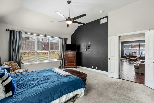 952 Tara Dr, Burleson, TX 76028 - carpeted bedroom featuring vaulted ceiling, baseboards, and ceiling fan