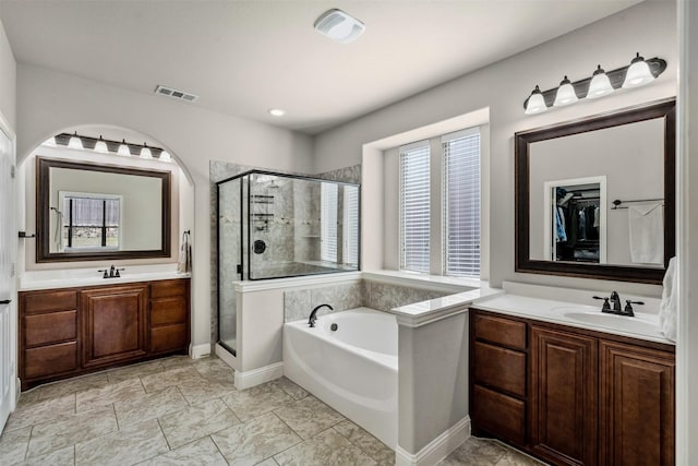 952 Tara Dr, Burleson, TX 76028 - full bathroom featuring a shower stall, a garden tub, and two vanities