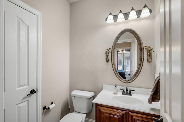 952 Tara Dr, Burleson, TX 76028 - half bathroom featuring toilet and vanity