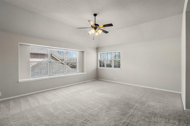 952 Tara Dr, Burleson, TX 76028 - spare room featuring carpet floors, baseboards, ceiling fan, and lofted ceiling