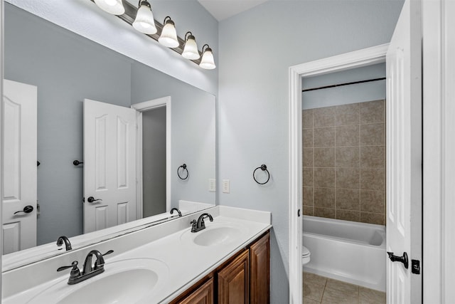 952 Tara Dr, Burleson, TX 76028 - full bathroom with toilet, double vanity, tile patterned flooring, and shower / washtub combination