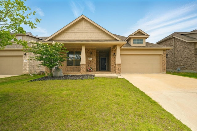 524 Big Horn Pass, Denton, TX 76210 - craftsman-style house featuring concrete driveway, a front yard, brick siding, and a garage