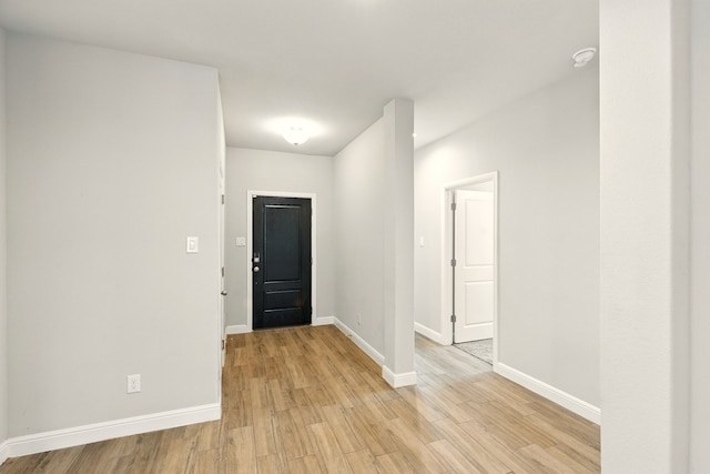 524 Big Horn Pass, Denton, TX 76210 - entryway with light wood-type flooring and baseboards