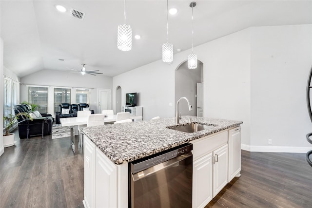 558 Lily St, Crowley, TX 76036 - kitchen with stainless steel dishwasher, a sink, arched walkways, dark wood-type flooring, and a center island with sink
