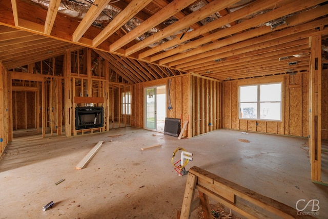 6809 Beals Creek Dr, Abilene, TX 79606 - miscellaneous room with heating unit and a fireplace
