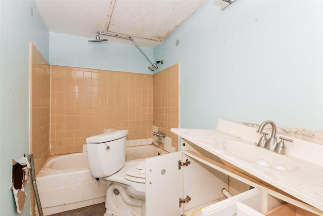 214 Independence Dr, Garland, TX 75043 - bathroom featuring shower / bathtub combination, toilet, and vanity