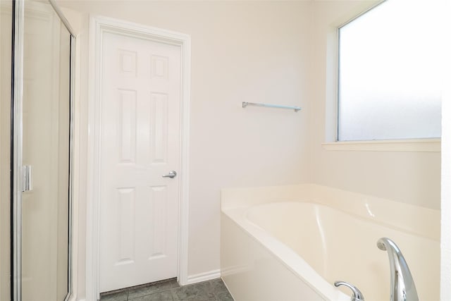 1012 Fairweather Dr, Fort Worth, TX 76120 - bathroom featuring a shower stall and a bath