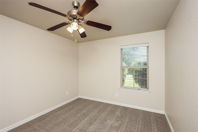 7660 Hollow Forest Dr, Fort Worth, TX 76123 - empty room with dark carpet, baseboards, and ceiling fan