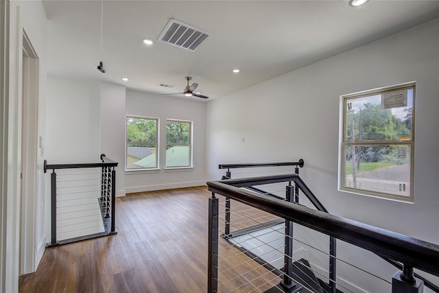 312 Beckham St, Sulphur Springs, TX 75482 - hallway featuring an upstairs landing, recessed lighting, wood finished floors, and baseboards