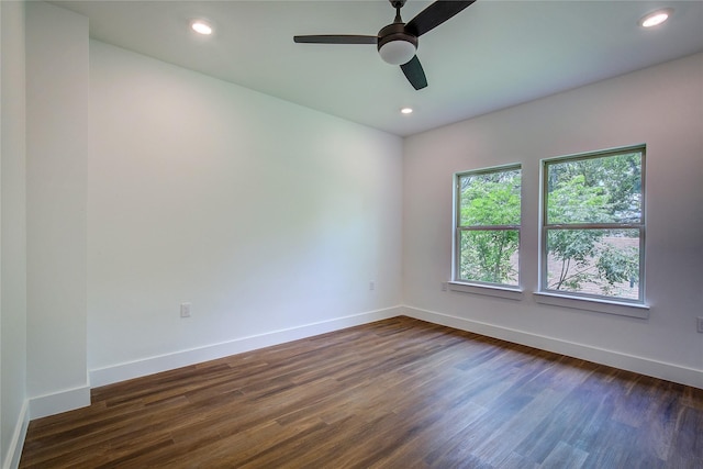 312 Beckham St, Sulphur Springs, TX 75482 - spare room featuring baseboards, dark wood-style floors, and recessed lighting