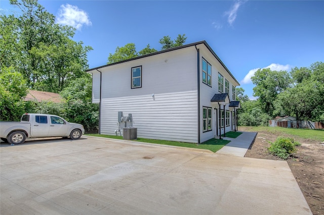312 Beckham St, Sulphur Springs, TX 75482 - view of home's exterior featuring cooling unit
