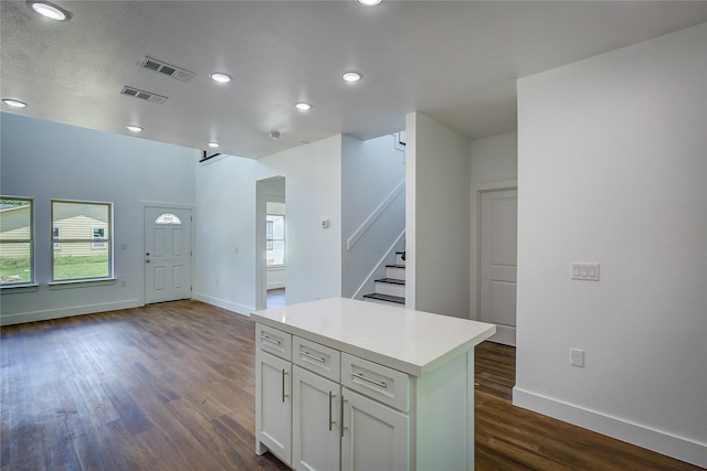 312 Beckham St, Sulphur Springs, TX 75482 - kitchen featuring dark wood-type flooring, baseboards, healthy amount of natural light, and recessed lighting