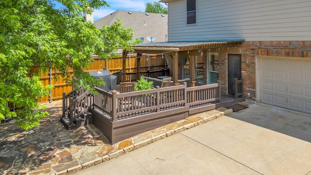2081 Ashbourne Dr, Rockwall, TX 75087 - wooden terrace with a garage and concrete driveway