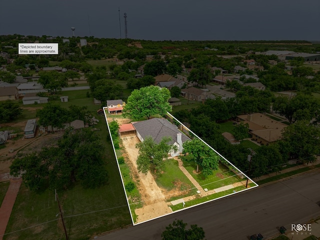 112 5th Ave, Coleman, TX 76834 - aerial view of property and surrounding area featuring property parcel outlined