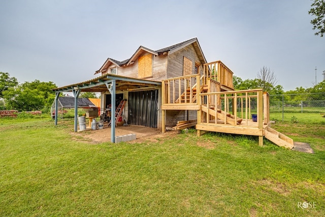 112 5th Ave, Coleman, TX 76834 - back of property with stairs and a wooden deck