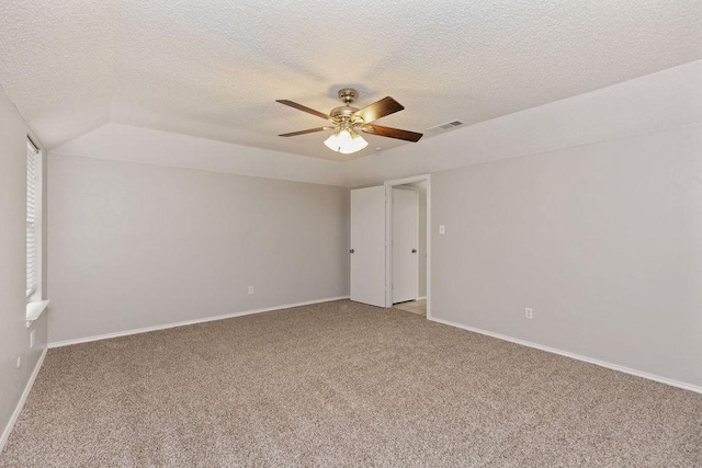 2109 Dartmouth Dr, Arlington, TX 76015 - unfurnished room with light colored carpet, ceiling fan, a textured ceiling, and baseboards