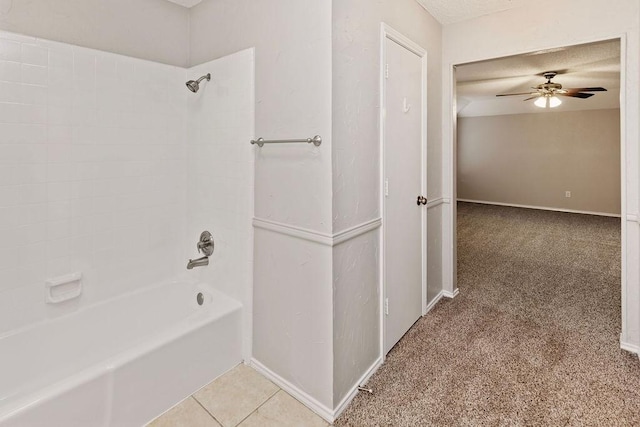 2109 Dartmouth Dr, Arlington, TX 76015 - full bathroom with shower / bathtub combination, ceiling fan, and baseboards