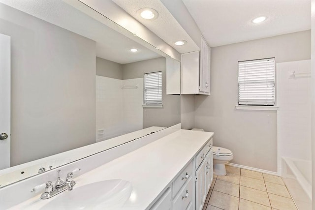 2109 Dartmouth Dr, Arlington, TX 76015 - bathroom with vanity, toilet, tile patterned floors, recessed lighting, and bathtub / shower combination