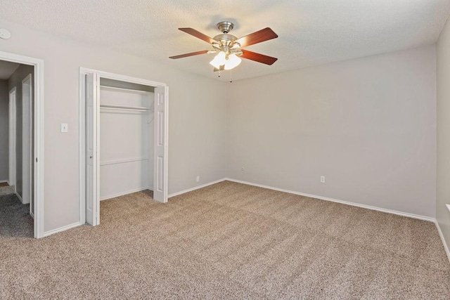 2109 Dartmouth Dr, Arlington, TX 76015 - unfurnished bedroom with carpet flooring, a closet, baseboards, ceiling fan, and a textured ceiling