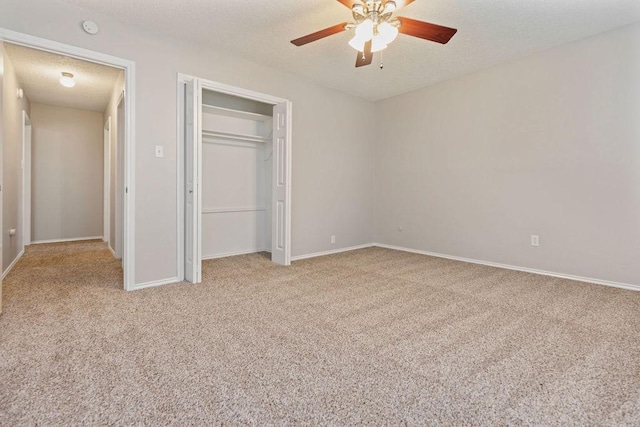 2109 Dartmouth Dr, Arlington, TX 76015 - unfurnished bedroom with carpet, a closet, baseboards, ceiling fan, and a textured ceiling