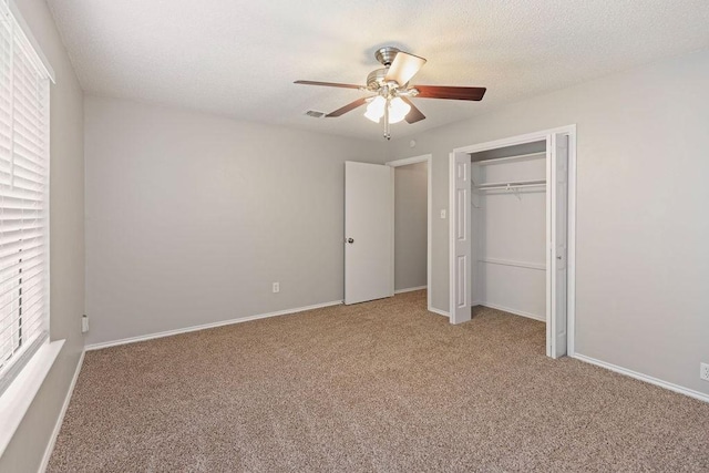 2109 Dartmouth Dr, Arlington, TX 76015 - unfurnished bedroom featuring carpet flooring, ceiling fan, a closet, and baseboards
