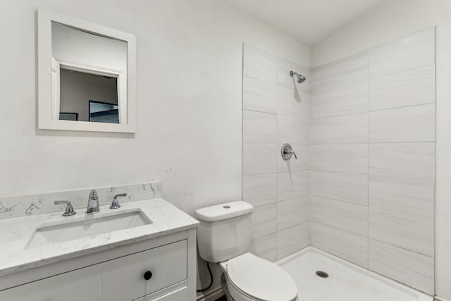9132 Choctaw Trl, Flower Mound, TX 75022 - full bathroom with a tile shower, vanity, and toilet