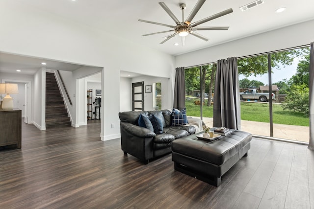 9132 Choctaw Trl, Flower Mound, TX 75022 - living room with dark wood-type flooring, ceiling fan, stairway, recessed lighting, and baseboards