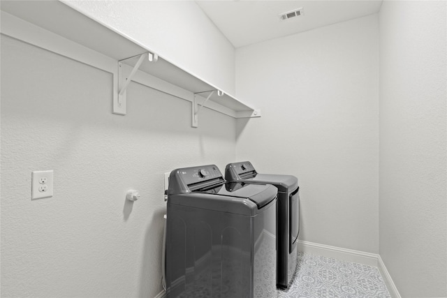 7224 Bucanero, Grand Prairie, TX 75054 - laundry area featuring separate washer and dryer and baseboards