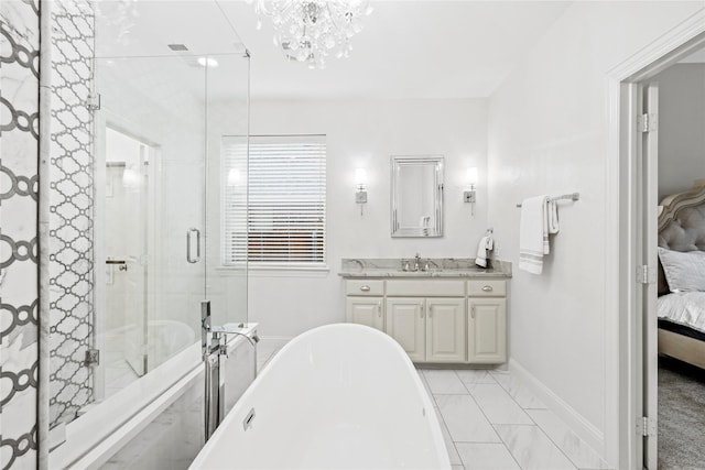 7224 Bucanero, Grand Prairie, TX 75054 - ensuite bathroom with a freestanding tub, marble look tile flooring, vanity, and baseboards