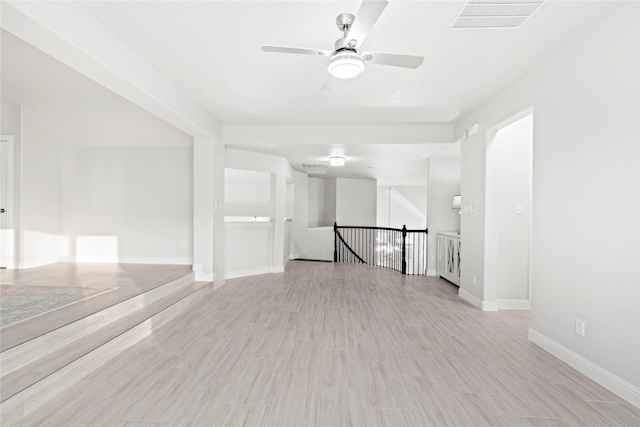 7224 Bucanero, Grand Prairie, TX 75054 - unfurnished room featuring ceiling fan, baseboards, and light wood-type flooring