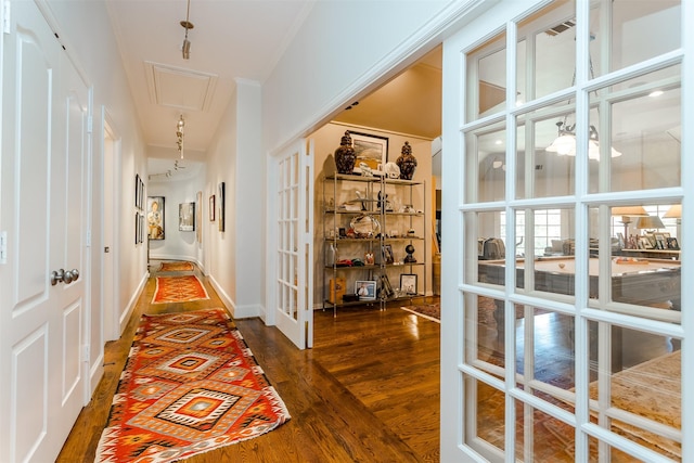 6406 Glendora Ave, Dallas, TX 75230 - corridor featuring french doors, attic access, and wood finished floors