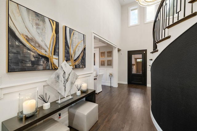 13580 Proud Clairon St, Frisco, TX 75035 - foyer with dark wood-type flooring, stairway, a high ceiling, and a chandelier