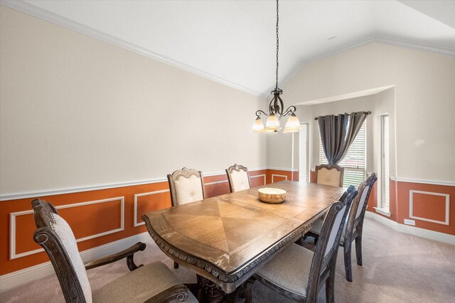 2604 Grand Colonial St, Grand Prairie, TX 75054 - carpeted dining room featuring a wainscoted wall, vaulted ceiling, a chandelier, and crown molding