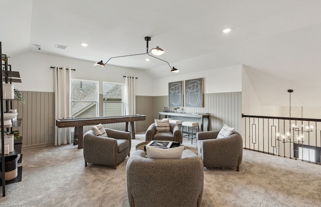 4267 Arlington Ave, Mckinney, TX 75071 - living area featuring lofted ceiling, carpet flooring, wainscoting, a chandelier, and recessed lighting