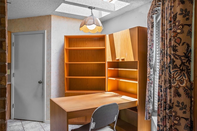 2025 Sancerre Ln, Carrollton, TX 75007 - office area with a skylight, a textured ceiling, and light tile patterned flooring