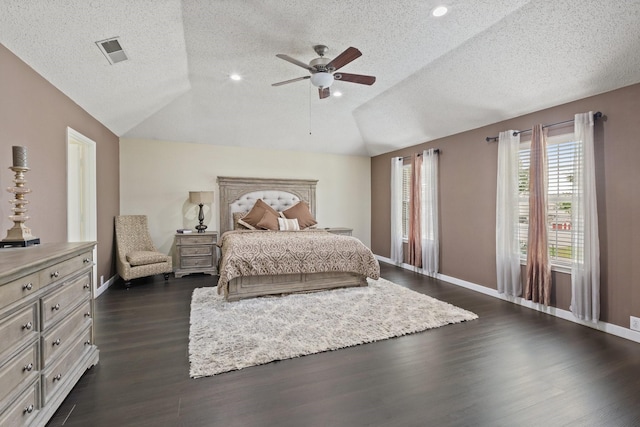 1317 Woodthorpe Dr, Mesquite, TX 75181 - bedroom featuring a textured ceiling, vaulted ceiling, baseboards, dark wood-type flooring, and ceiling fan