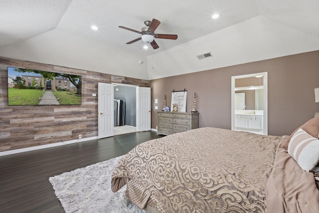 1317 Woodthorpe Dr, Mesquite, TX 75181 - bedroom with wood finished floors, wooden walls, recessed lighting, high vaulted ceiling, and ensuite bathroom