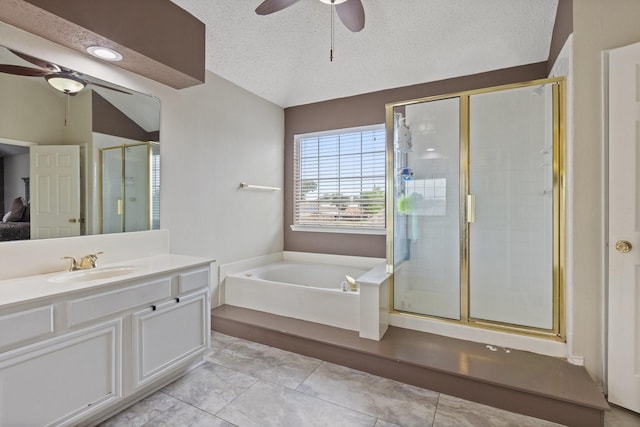 1317 Woodthorpe Dr, Mesquite, TX 75181 - full bathroom featuring ceiling fan, vaulted ceiling, a shower stall, a bath, and vanity
