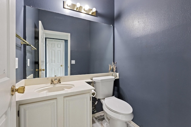 1317 Woodthorpe Dr, Mesquite, TX 75181 - half bath with toilet, vanity, and baseboards
