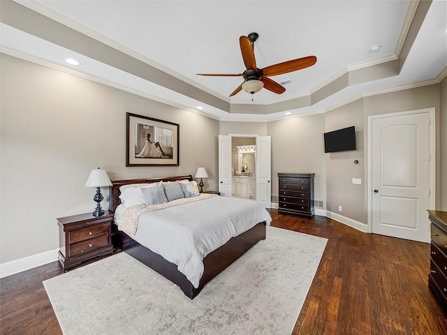 2901 Lakeview Dr, Prosper, TX 75078 - bedroom featuring a tray ceiling, crown molding, baseboards, dark wood finished floors, and connected bathroom