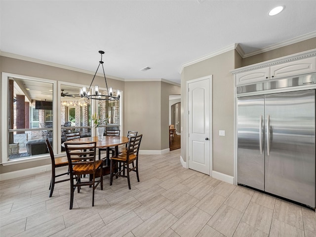 2901 Lakeview Dr, Prosper, TX 75078 - dining room featuring baseboards, ornamental molding, a chandelier, wood finish floors, and arched walkways